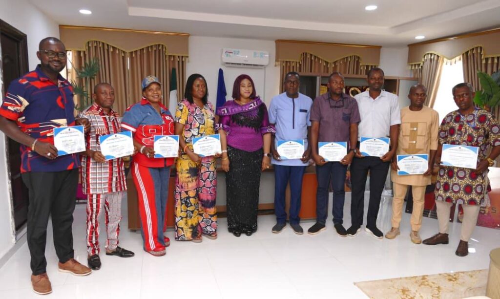 PARTICIPANTS AT THE TRAINING ON CAREER COACHING RECEIVE CERTIFICATES FROM THE RECTOR , DR.AWUZIE
